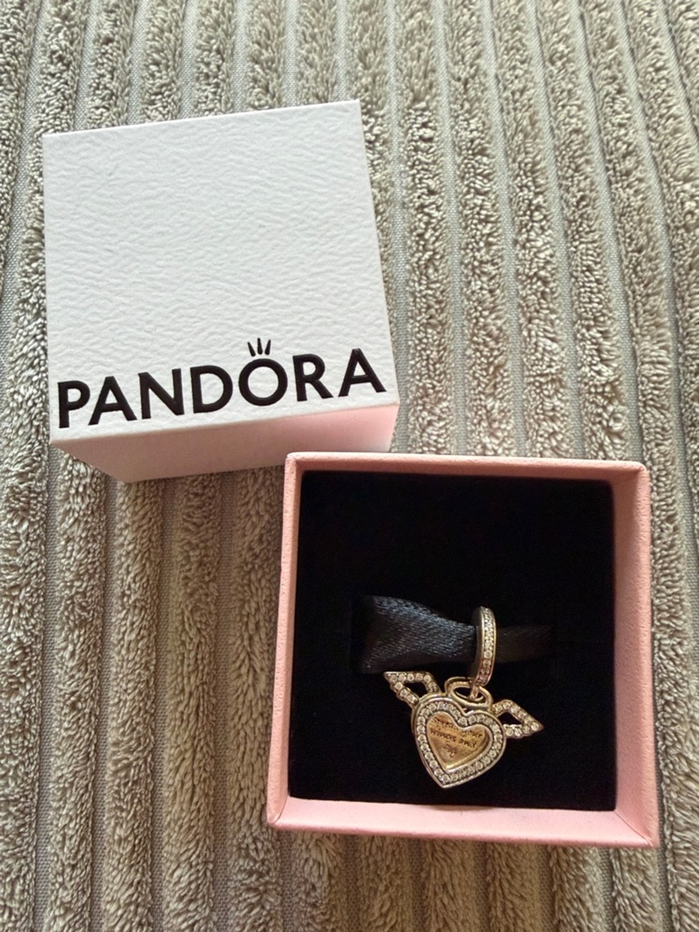 Never worn. Pandora Gold Heart with Winged Charm and Clear Stones - Gold
